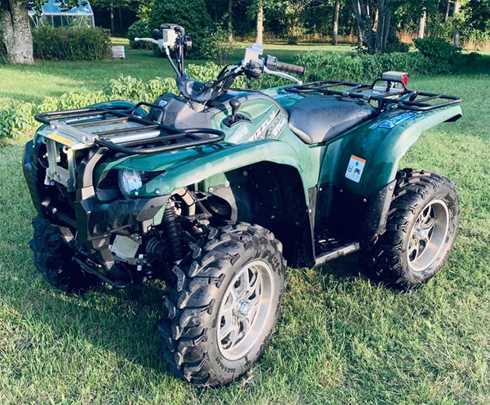 Grön fyrhjuling Yamaha YFM700 EPS Grizzly stulen i Visby